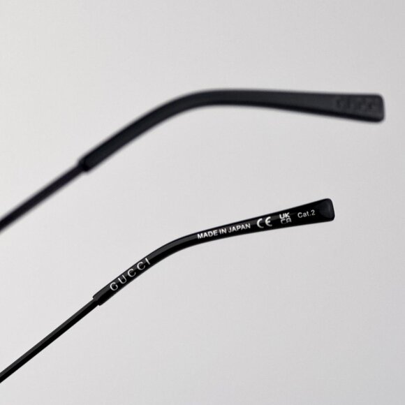 Gucci GG1876S 004 Sunglasses – Black Metal Square Frame with Green Lenses